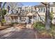 Charming townhouse with a well-manicured front yard and inviting entrance at 1303 Dylan Heath Ct, Raleigh, NC 27608