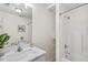 Bright bathroom with white vanity, modern fixtures, and shower-tub combination at 138 Sherwood Ln, Sanford, NC 27332