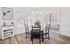Bright dining room featuring modern light fixture and access to backyard deck at 138 Sherwood Ln, Sanford, NC 27332