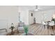 Bright living room with wood-look floors, white trim and modern decor at 138 Sherwood Ln, Sanford, NC 27332