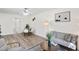 Cozy living room featuring wood-look floors, modern decor, and natural light at 138 Sherwood Ln, Sanford, NC 27332