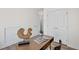 Office space with wood-look floors, white trim, and a view to other rooms at 138 Sherwood Ln, Sanford, NC 27332