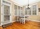 Cozy breakfast nook features a white table, chairs, and a door leading to the exterior at 1428 Heritage Links Dr, Wake Forest, NC 27587