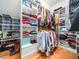 Walk-in closet with organized shelving and hanging space for clothing and accessories at 1428 Heritage Links Dr, Wake Forest, NC 27587