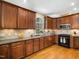 Functional kitchen featuring granite countertops and ample cabinet space for storage at 1428 Heritage Links Dr, Wake Forest, NC 27587