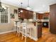 Well-appointed kitchen with a breakfast bar, perfect for casual dining and entertaining at 1428 Heritage Links Dr, Wake Forest, NC 27587