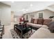 Spacious living area offering a comfortable sofa, coffee table, and open space for relaxation and entertainment at 1428 Heritage Links Dr, Wake Forest, NC 27587