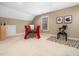 Bright living room showcasing a table with chairs, a window, and a unique black and white rug at 1428 Heritage Links Dr, Wake Forest, NC 27587