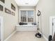 Relaxing spare room featuring a window seat with storage and natural light at 1428 Heritage Links Dr, Wake Forest, NC 27587