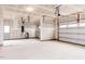 Spacious three car garage awaiting drywall and paint at 145 Bering Cir, Angier, NC 27501