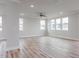 Bright, spacious living room boasting hardwood floors, neutral paint, and an abundance of natural light at 145 Bering Cir, Angier, NC 27501