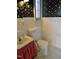 Bathroom with white tile and traditional fixtures at 1703 St. Mary'S St, Raleigh, NC 27608