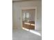 An entryway showcases the marble floors leading to a living room with hardwood floors and French doors at 1703 St. Mary'S St, Raleigh, NC 27608
