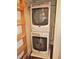 Efficient laundry area featuring stacked Maytag washer and dryer for space-saving convenience at 1703 St. Mary'S St, Raleigh, NC 27608