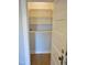 Walk in pantry with white shelves and wood flooring at 1703 St. Mary'S St, Raleigh, NC 27608