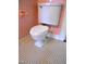 Close up of the toilet and tile flooring of the bathroom at 1703 St. Mary'S St, Raleigh, NC 27608