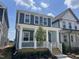 Charming two-story home featuring a welcoming front porch in a residential neighborhood at 1919 Plott Balsam Dr, Wendell, NC 27591