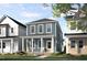 Charming two-story home featuring a welcoming front porch and manicured landscaping at 1919 Plott Balsam Dr, Wendell, NC 27591