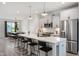 Bright eat-in kitchen with an island, stainless steel appliances, and white cabinets at 1919 Plott Balsam Dr, Wendell, NC 27591