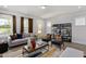 Inviting living room with contemporary furnishings, neutral tones, and abundant natural light at 1919 Plott Balsam Dr, Wendell, NC 27591