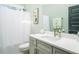 Clean bathroom with updated vanity, modern fixtures, and shower with curtain at 271 Sacred Fire Rd, Louisburg, NC 27549