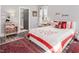 Comfortable bedroom with stylish furnishings and a view into the en-suite bathroom at 271 Sacred Fire Rd, Louisburg, NC 27549