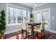 Bright dining area features a window view, seating for four, and access to the outdoor area at 271 Sacred Fire Rd, Louisburg, NC 27549