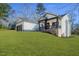 Charming two-story home with inviting front porch and landscaped yard at 271 Sacred Fire Rd, Louisburg, NC 27549