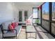 Relaxing screened porch with comfortable seating, providing an ideal spot for outdoor enjoyment at 271 Sacred Fire Rd, Louisburg, NC 27549