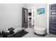 Home workout room with view to living room and gray scale decor at 271 Sacred Fire Rd, Louisburg, NC 27549