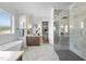 Bright bathroom with walk-in shower, soaking tub, and double vanity at 2829 Theresa Eileen Way, Raleigh, NC 27603
