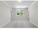 Neutral bedroom with large window overlooking the neighborhood at 2829 Theresa Eileen Way, Raleigh, NC 27603