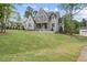 Beautiful home showcasing freshly laid sod, a stately entrance, and classic architectural design elements at 2829 Theresa Eileen Way, Raleigh, NC 27603
