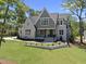 Beautiful exterior of home with a manicured lawn, and elegant architectural details on a sunny day at 2829 Theresa Eileen Way, Raleigh, NC 27603