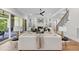 Bright living room features a fireplace, built-in shelving, and sliding doors to the outdoor patio at 2829 Theresa Eileen Way, Raleigh, NC 27603