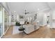 Bright living room has built in shelves, a fireplace, and access to other parts of the home at 2829 Theresa Eileen Way, Raleigh, NC 27603