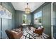Beautiful office space has natural light, a statement rug, and sleek furniture at 2829 Theresa Eileen Way, Raleigh, NC 27603