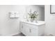 Bright bathroom with a double sink vanity, quartz countertop, and a large mirror at 2832 Egert Dr, Haw River, NC 27258