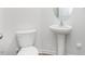 Toilet and pedestal sink in a small bathroom at 2834 Egert Dr, Haw River, NC 27258