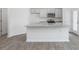 Kitchen island with granite countertop and stainless steel sink at 2834 Egert Dr, Haw River, NC 27258