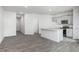 Open-concept living area and kitchen with stainless steel appliances at 2834 Egert Dr, Haw River, NC 27258