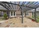 Outdoor brick patio features a pergola, fireplace, and stone flooring, perfect for entertaining guests at 3001 Hunters Bluff Dr, Raleigh, NC 27606