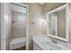 Updated bathroom with tiled shower and modern vanity at 3001 Hunters Bluff Dr, Raleigh, NC 27606
