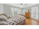 Bedroom featuring a large bay window and hardwood flooring at 3001 Hunters Bluff Dr, Raleigh, NC 27606