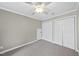 Neutral bedroom with plush carpet and closet at 3001 Hunters Bluff Dr, Raleigh, NC 27606