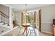 Breakfast nook with a bay window overlooking landscaped yard at 3001 Hunters Bluff Dr, Raleigh, NC 27606