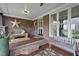 Cozy front porch with brick accents, comfortable seating, and stylish decor at 3001 Hunters Bluff Dr, Raleigh, NC 27606