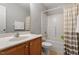 Bathroom with a shower-tub combination and single sink vanity at 3007 Cardinal Lake Dr, Durham, NC 27704