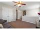 Loft space with neutral walls and carpeting, plus a ceiling fan at 3007 Cardinal Lake Dr, Durham, NC 27704