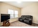 Cozy bedroom with comfortable seating and natural light at 303 Fortress Dr, Morrisville, NC 27560